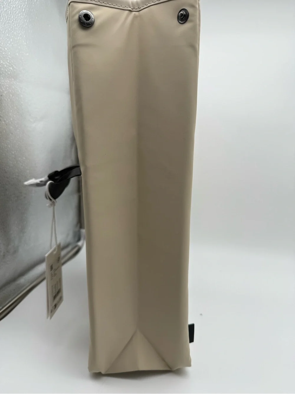 Rains Beige Backpack with Black Handle